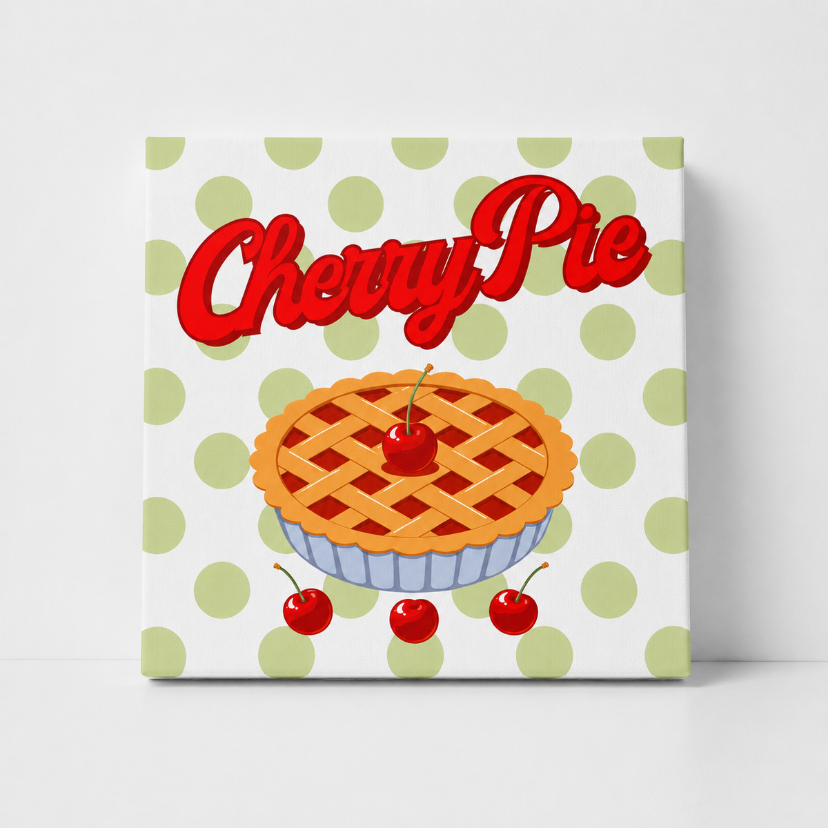 A square decorative sign or canvas featuring a retro-style illustration of a cherry pie on a white background with light green polka dots. The words 'Cherry Pie' are written in large red script across the top.