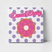 A square canvas print featuring a pink donut with colorful sprinkles on a white background with purple polka dots, and the text 'Donut Worry' in pink script across the top.